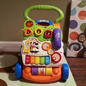 V tech sit to stand walker